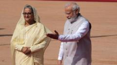 Indian Prime Minister Narendra Modi and Bangladesh opposition leader Khaleda Zia during separate public appearances